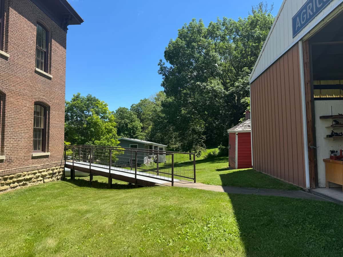 Wheelchair Ramp On The Back Of A Brick Building